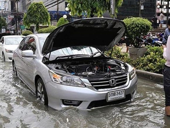 Sleepless night turns to commuter nightmare as floods soak Bangkok