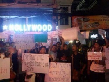 Phuket Protesters Head for Hollywood: Patong Police Officer Accused of Assault With Beer Bottle