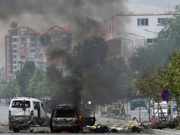 Explosions, gunfire as Taliban lay siege to Afghan parliament